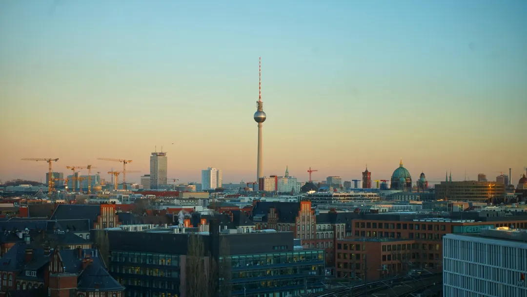 The Berlin skyline at dusk with the Fernsehturm and the Berlin Cathedral dome